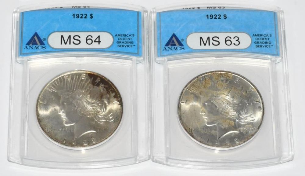 Lot 1442: 2 ANACS Graded Liberty Peace Silver Dollar Coins