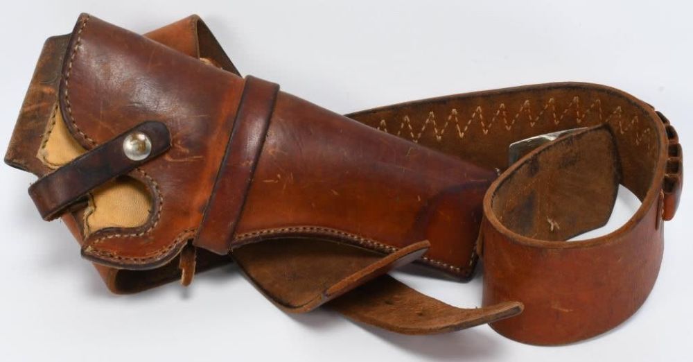 Lot 1565: Vintage Challenger Leather Holster & Cartridge