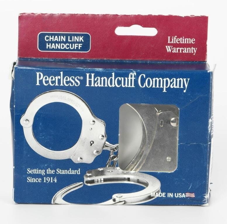 Lot 224: Peerless Handcuff  Model 700 w/Key