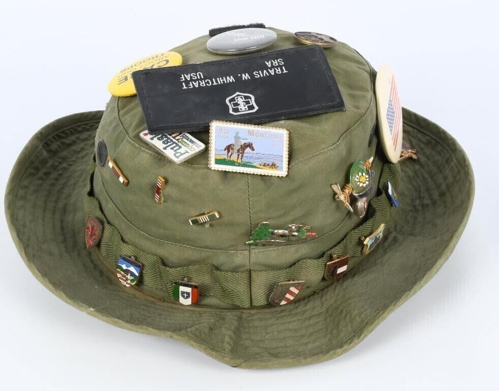 Lot 235: OD green U.S.  Military hat  with vintage pins