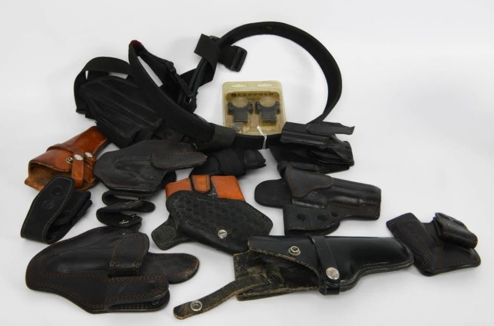 Lot 449: Lg Lot of Misc Holsters & LEUPOLD scope rings