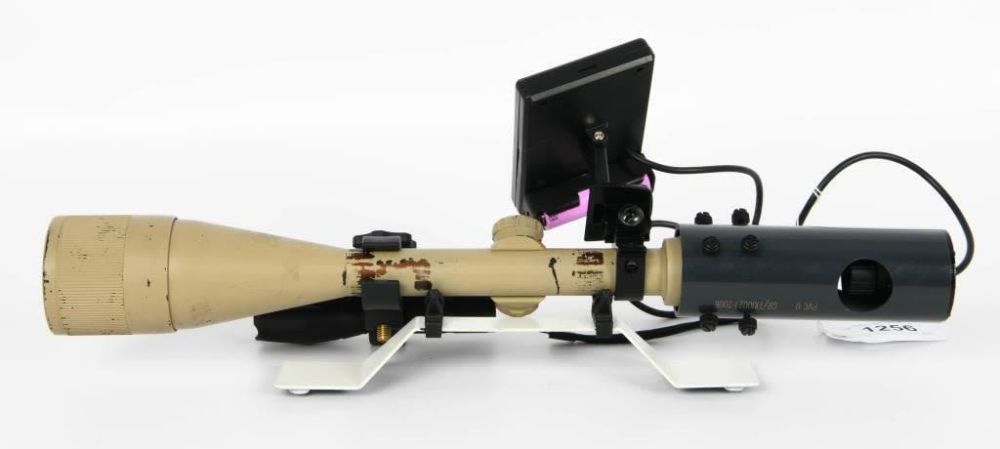 Lot 1256: Bushnell Riflescope equipped w/camera & Flashlite