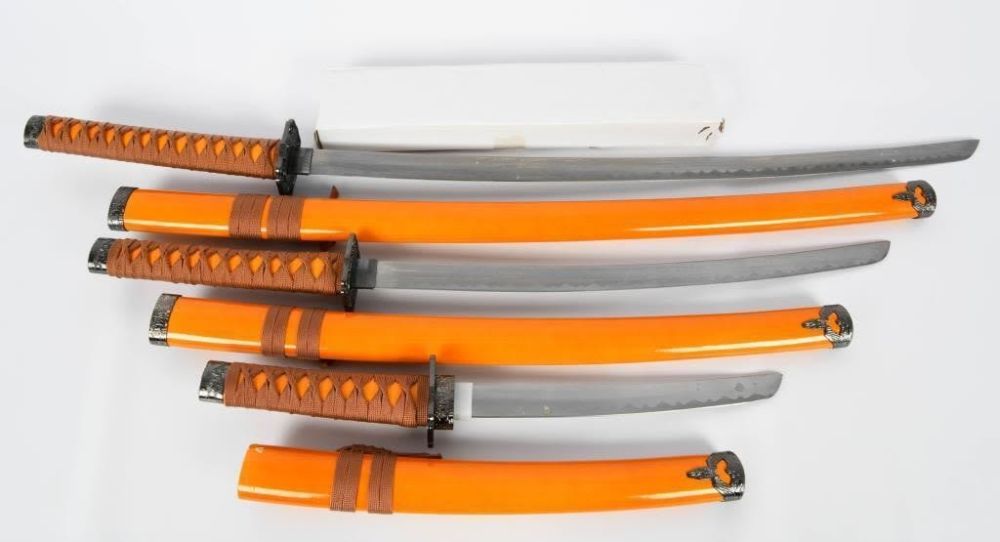 Lot 1259: New In The Box 3 Piece Samari Fantasy Sword Set