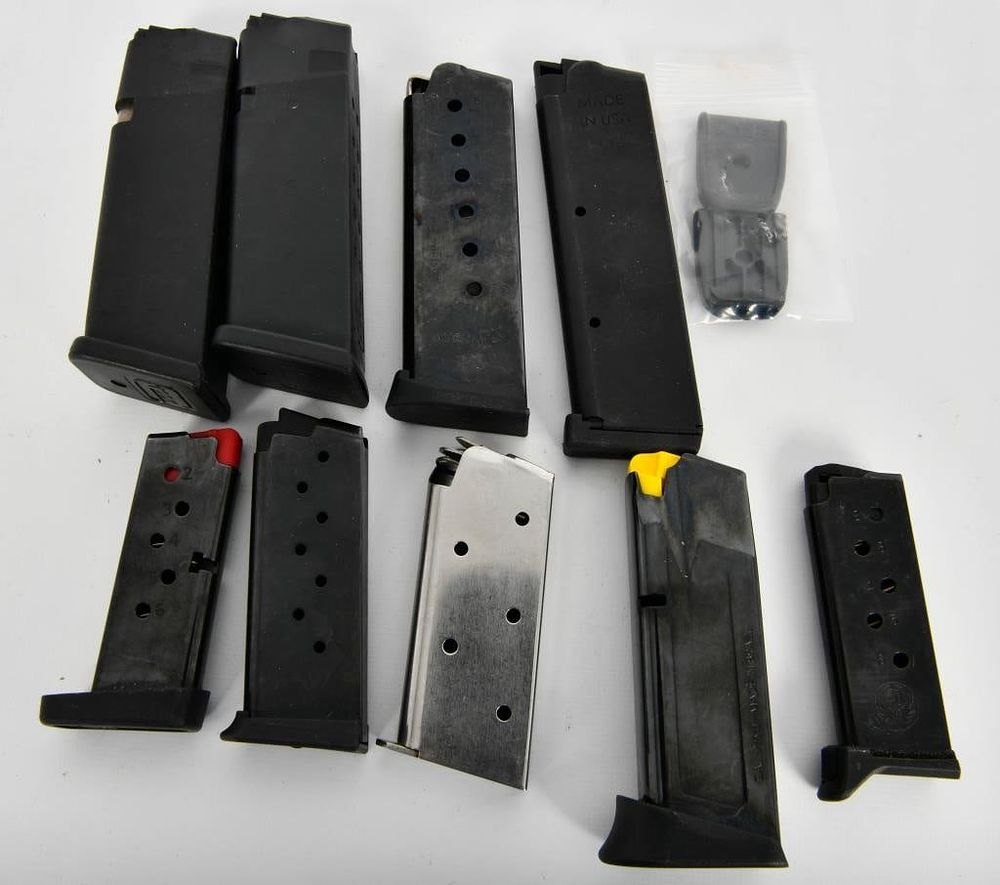 Lot 545: 9 Misc Handgun Magazines