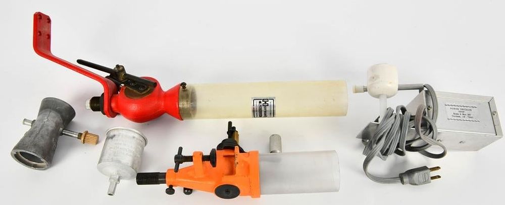 Lot 1052: Hornady Lock-N-Load Powder Measure,Red & Funnel &