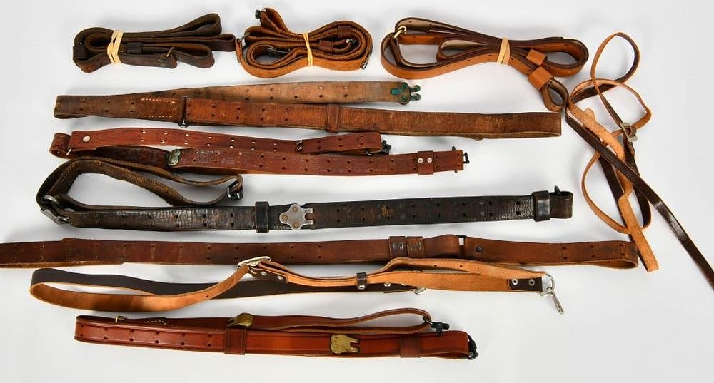 Lot 1520: Large Selection Of Various Size Leather Slings