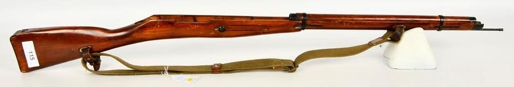 Lot 115: Mosin Nagant M91/30 Wood Stock and Sling