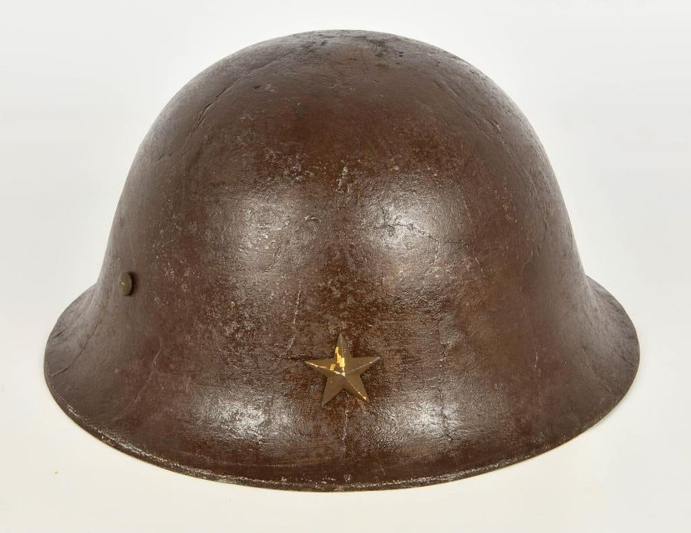 Lot 278: Japanese Iron Helmet Repro? repainted brown.