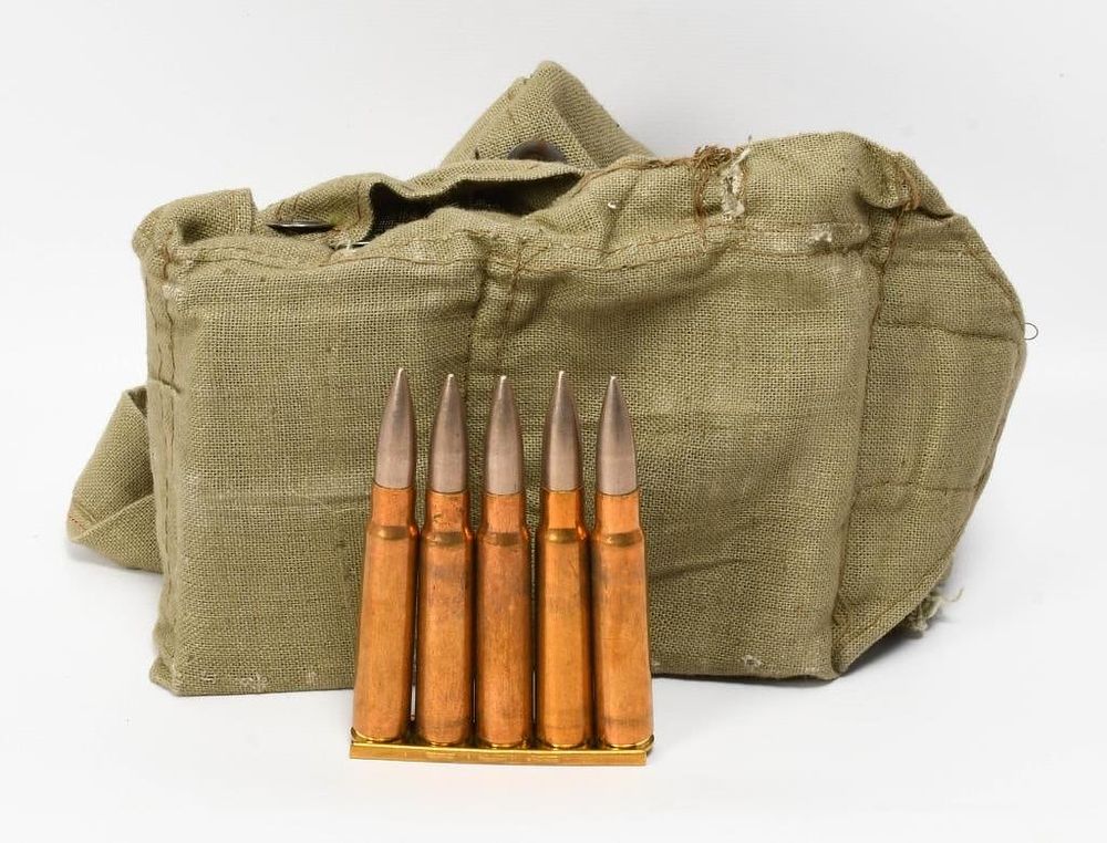 Lot 472: 40 Rounds of 8mm Mauser Ammo In a Bandoleer