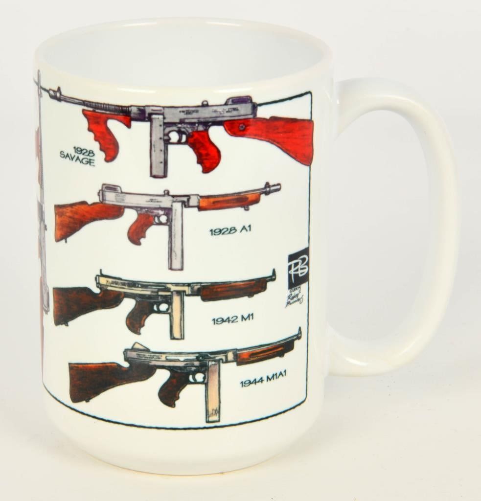 Lot 554: NIB Thompson Submachine Gun Design Coffee Cup