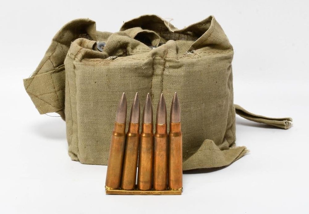 Lot 1165: 70 Round Bandoleer Of 8mm Silver Tip Ammunition