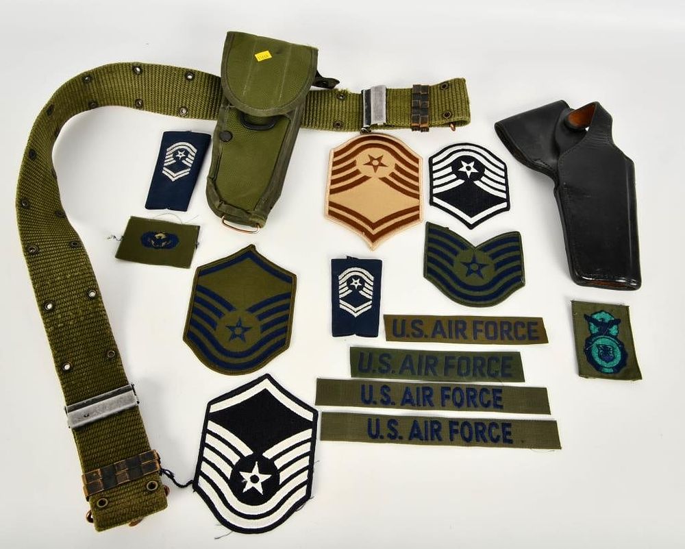 Lot 1262: 2 US Marked Holsters & Various Military Patches