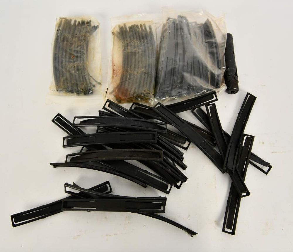Lot 1321: Lot of 64 SKS Metal Stripper Clips & Cleaning Kit