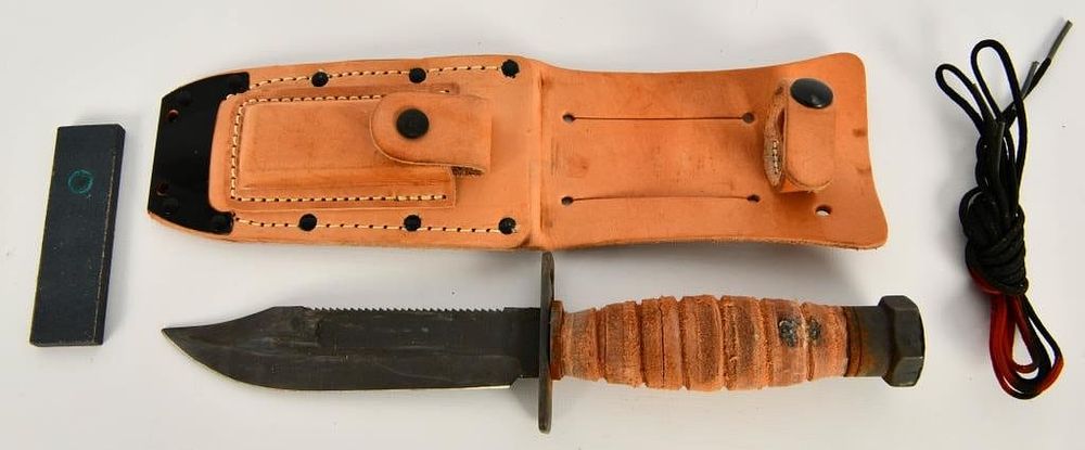 Lot 1331: Ontario Knife Co. Survival Knife sawback blade 5"