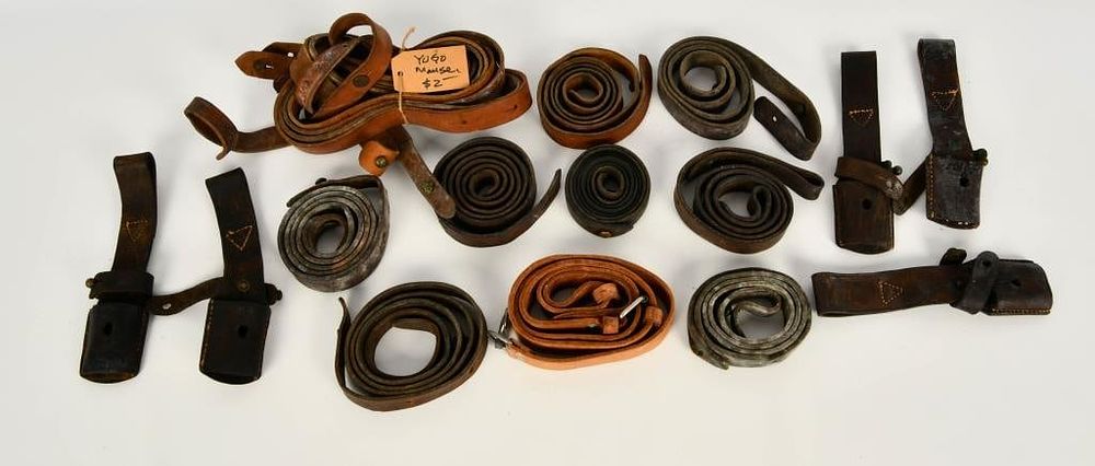Lot 1556: Miltary Leather goods  Slings, frogs, and more