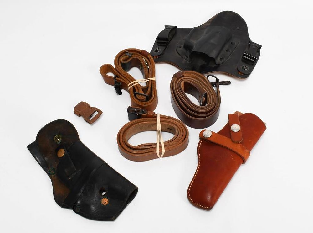 Lot 65: Leather goods lot! Holsters, and Slings