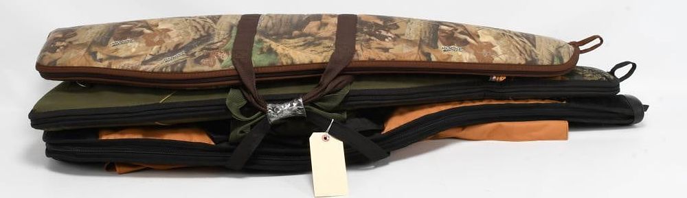 Lot 167: (3) various soft rifle/shotgun cases game winner
