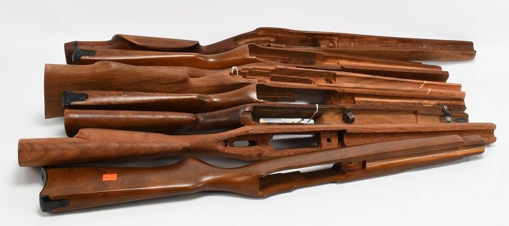 Lot 317: (8) Various wood stock, Ruger, Winchester & more