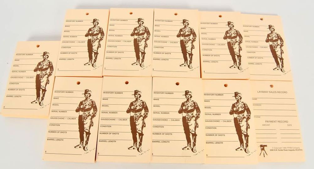 Lot 380: (9) packs Pre Drilled Gun Tags or Lay away Tags