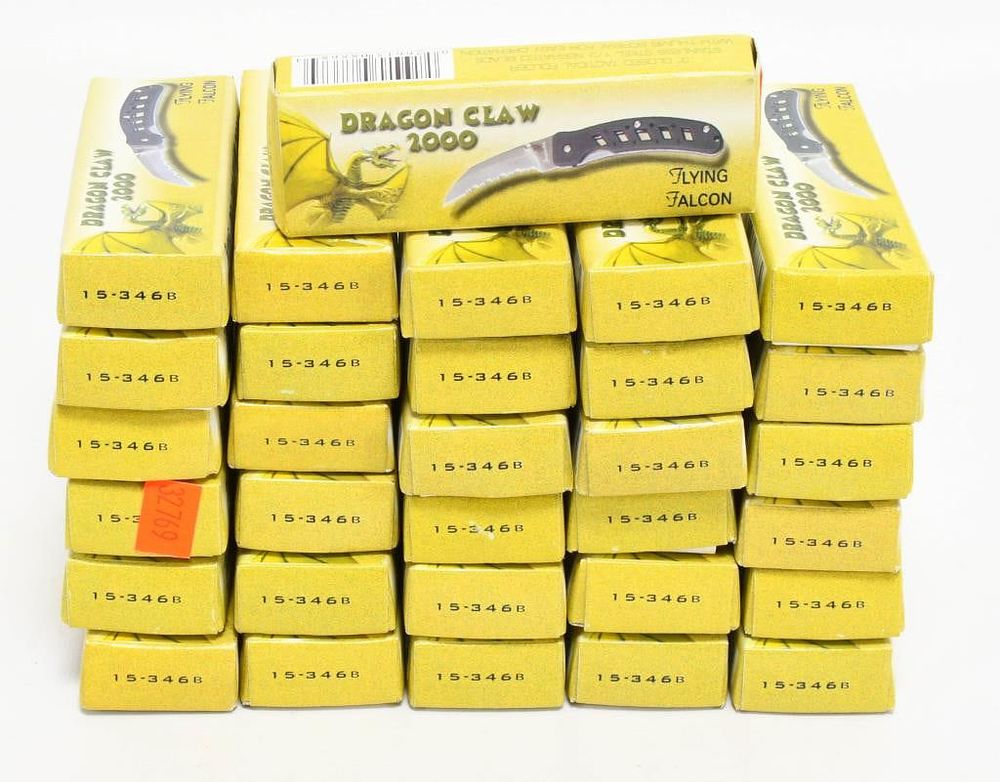 Lot 536: 31 NIB Flying Falcon Dragon Claw 2000 Knives