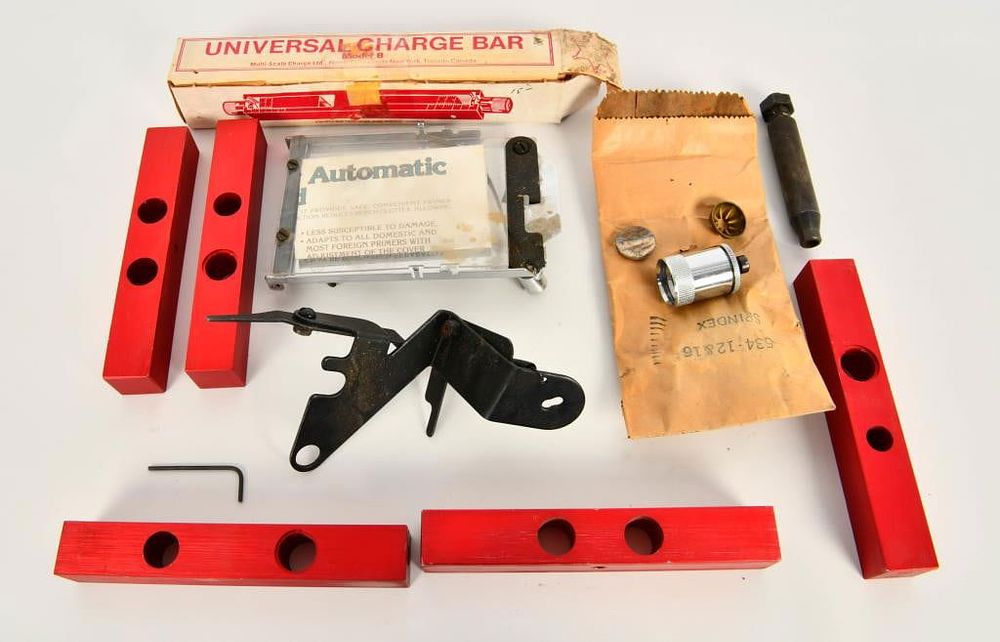 Lot 1271: MEC accessories: Bullet charging bars, Spindex