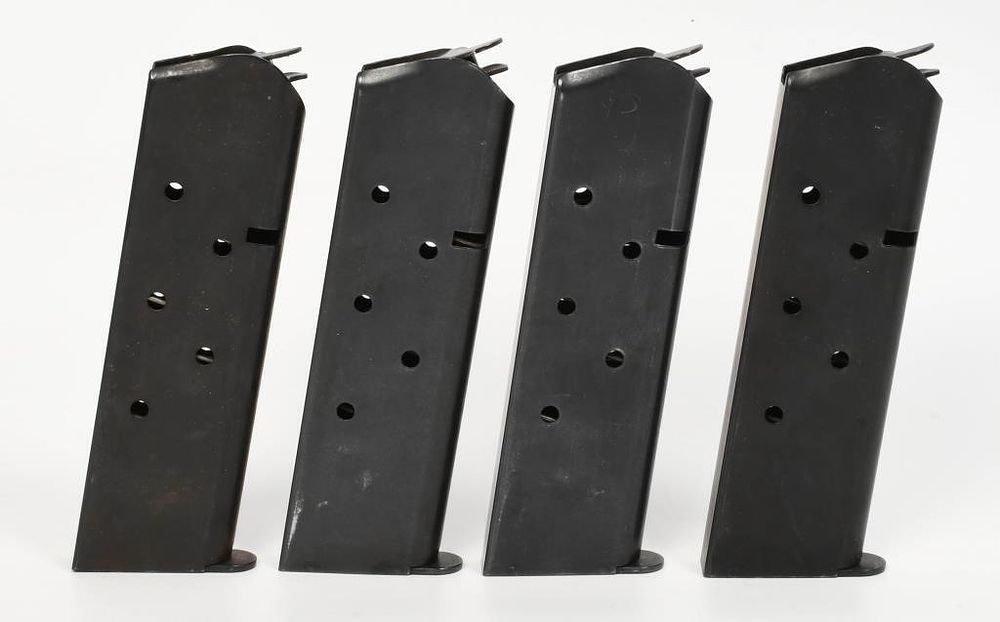Lot 338: 4 Metal 7 Round 1911 Magazines