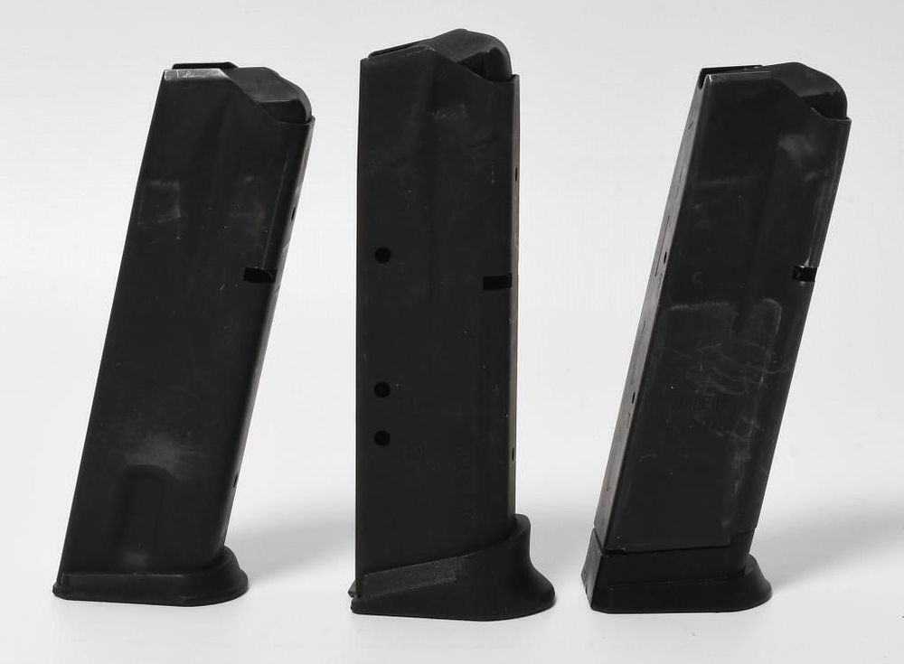 Lot 398: 3 Sig Sauer .40 S&W / .357 Sig Metal Magazines
