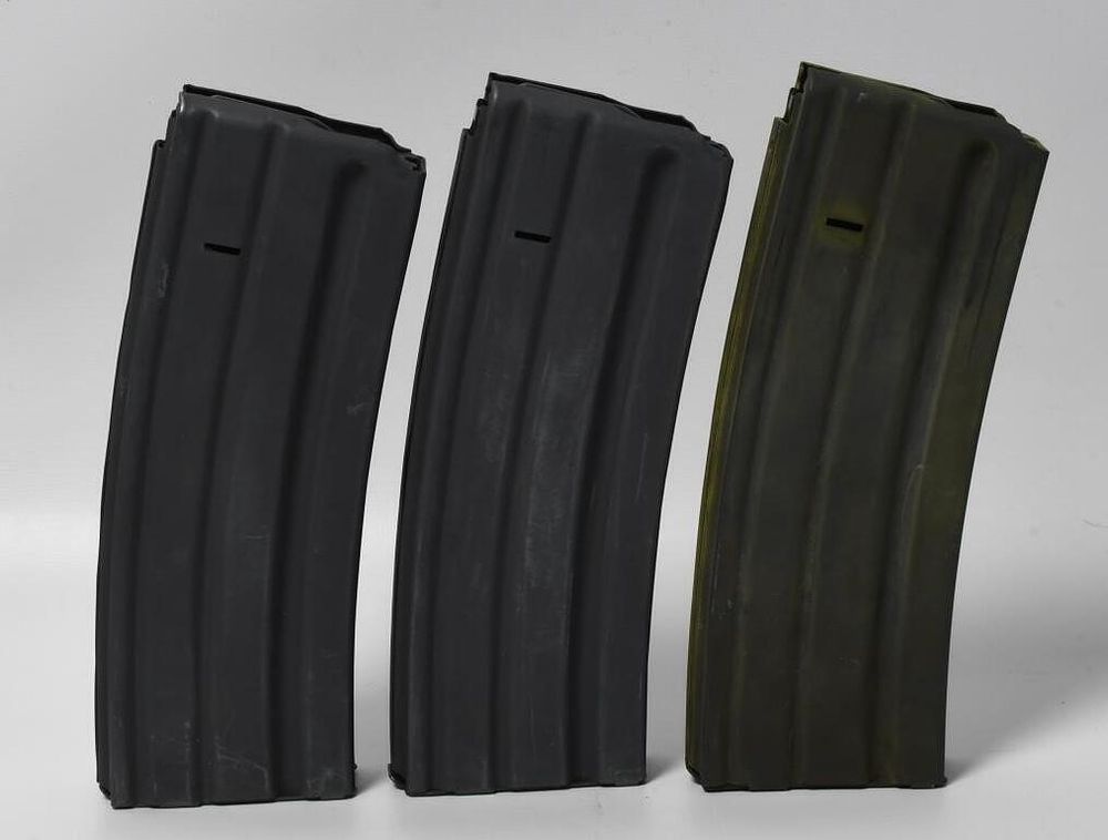Lot 428: 3 Unmarked AR-15 30 Round Metal Magazines
