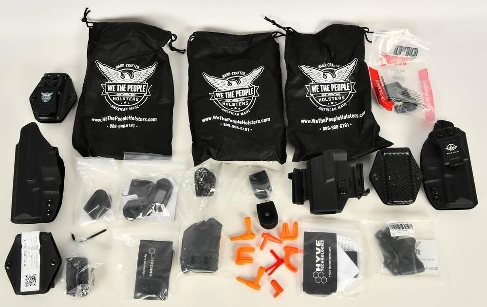 Lot 437: 2 Pole Craft Holsters & 1 Sig Sauer Kydex Holster