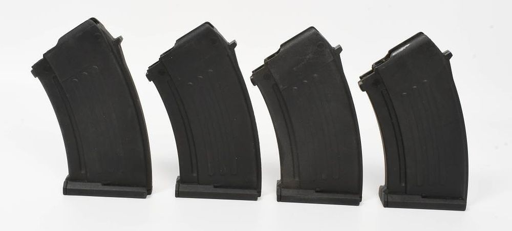Lot 1247: 4 Umarked 10 Round AK-47 Plastic Magazines