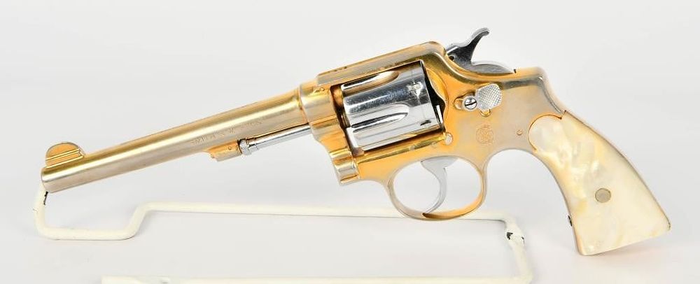 Lot 504: Smith & Wesson Military & Police Revolver Gold .38