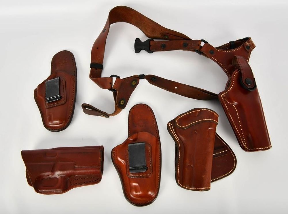 Lot 314: 5 Dark Tan Leather Holsters