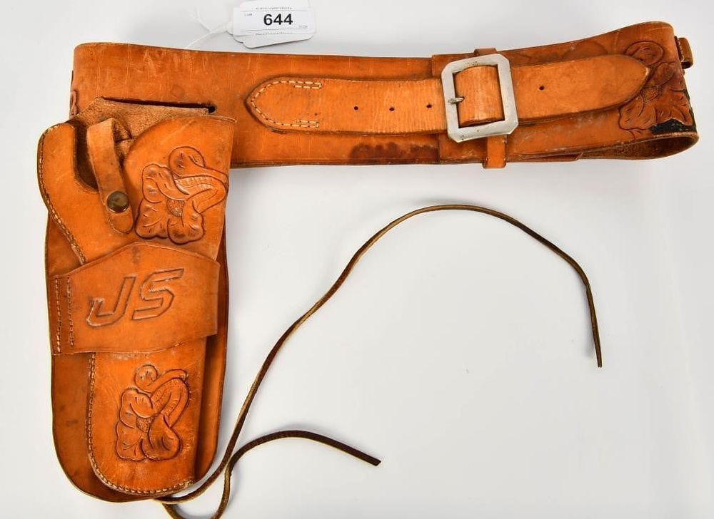 Lot 644: Hand Tooled Leather Holster & Belt Combo