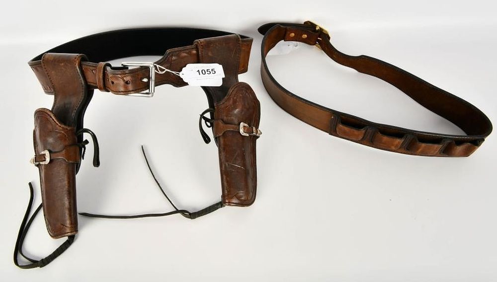 Lot 1055: Ted Blocker Dual Wheeled Leather Holsters & Belt