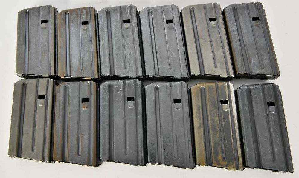 Lot 1061: 12 Colt Marked AR-15 20 Rd Metal Magazines