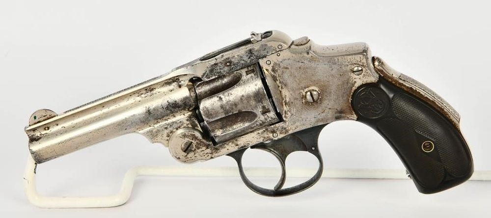 Lot 1074: Smith & Wesson Safety Hammerless 1st Model .38