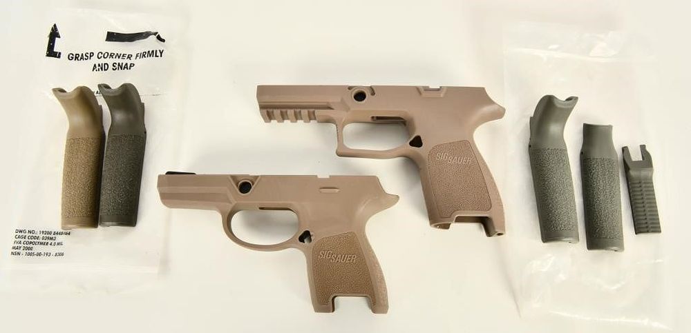 Lot 1228: 2 Sig Sauer Grip Modules in Tan Color