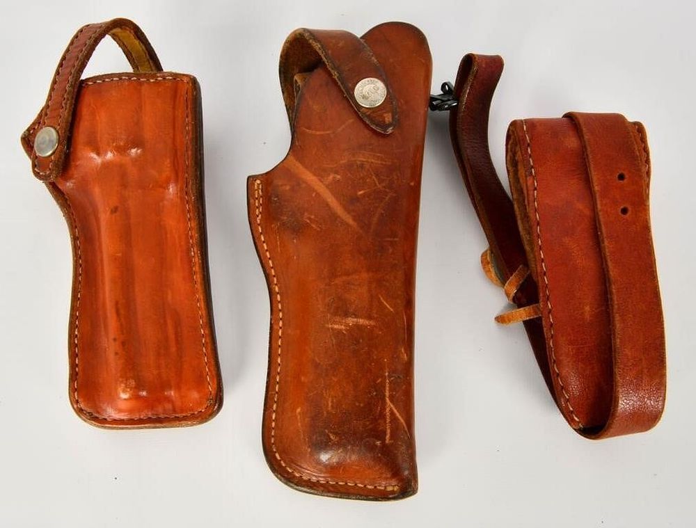 Lot 1583: 2 Leather Holsters & 1 Leather Rifle Sling