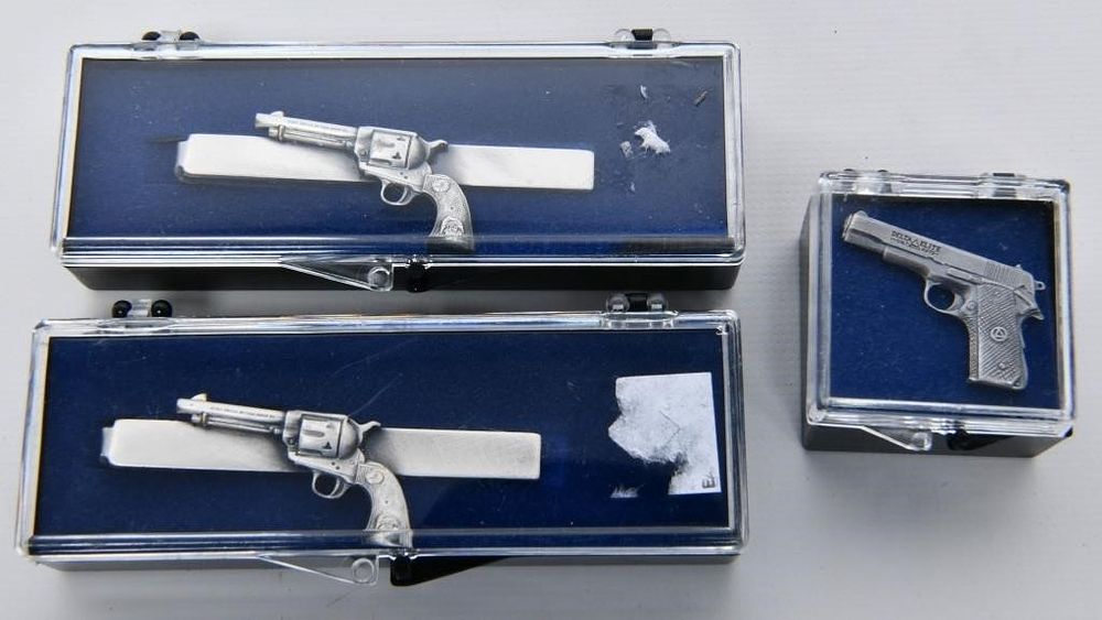 Lot 1142: 3 Collector Pistol Tie Clips