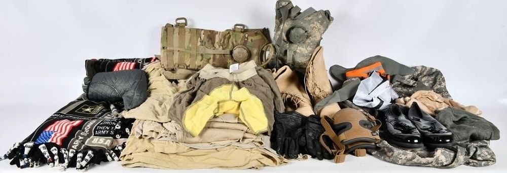 Lot 104: Military Rucksack Filled With Military Clothes