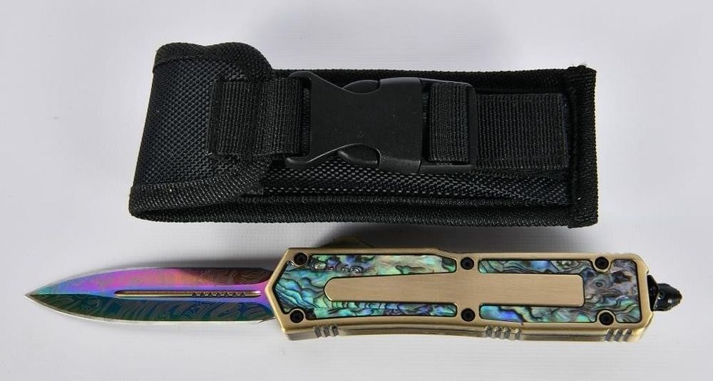 Lot 113: CLONE Microtech Special Edition Scarab D/E Knife