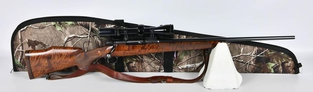 Lot 123: Pre-64 Winchester Model 70 Featherweight Deluxe