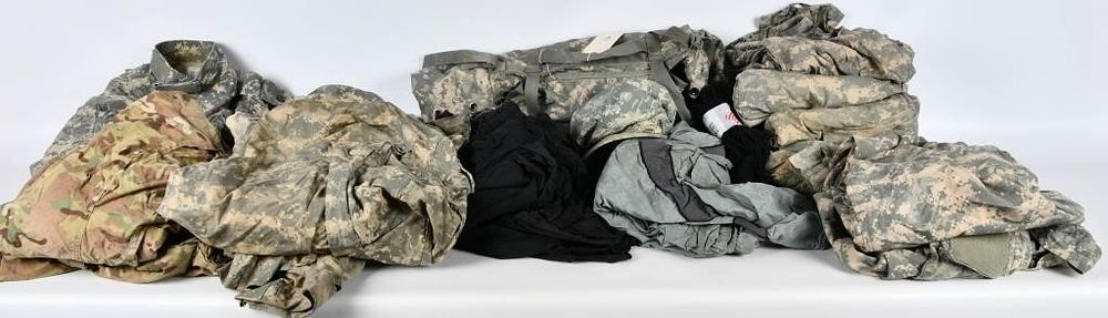 Lot 134: Large Military Rucksack Filled W/ Military Clothes