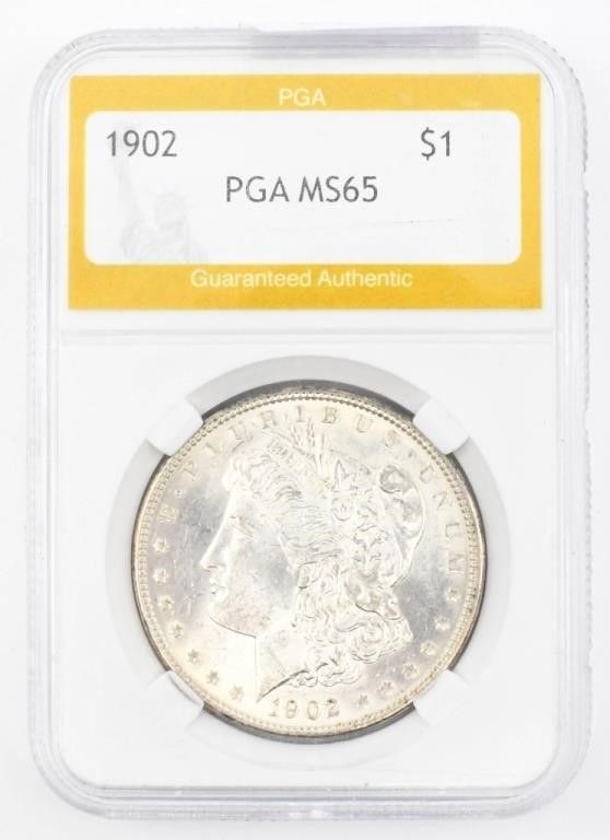 Lot 248: Uncirculated PGA Graded Morgan Silver Dollar