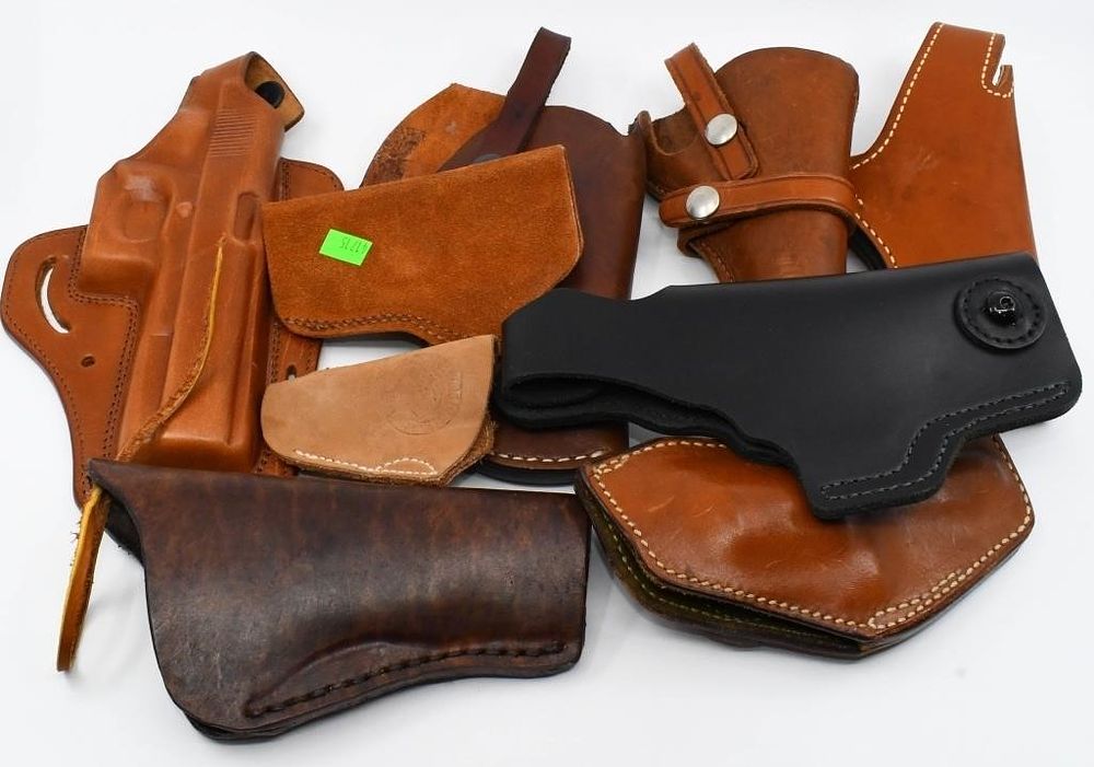 Lot 257: 8 Various Size Leather Holsters