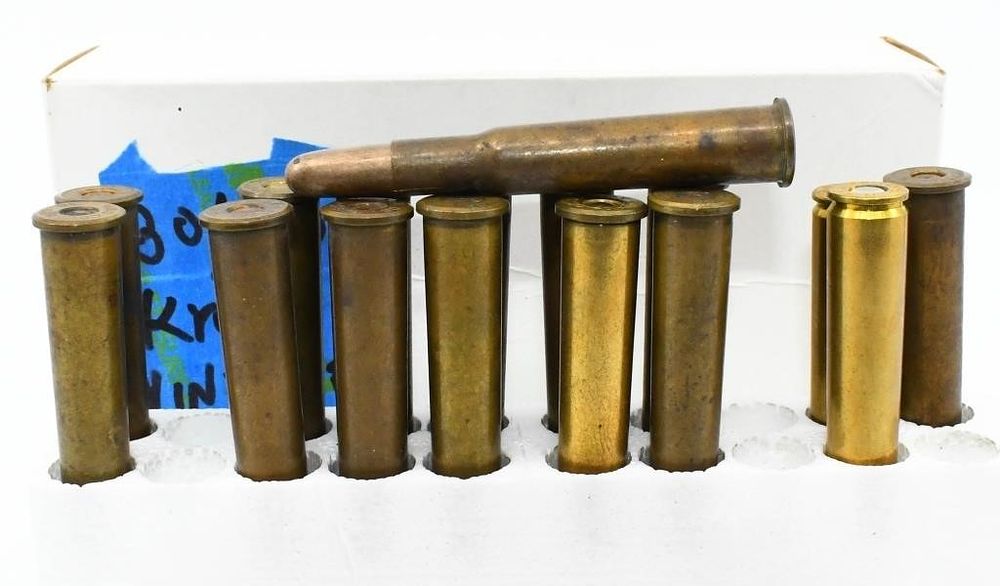 Lot 670: 14 Rounds Of 30-40 Krag Ammo & 2 8mm Rds