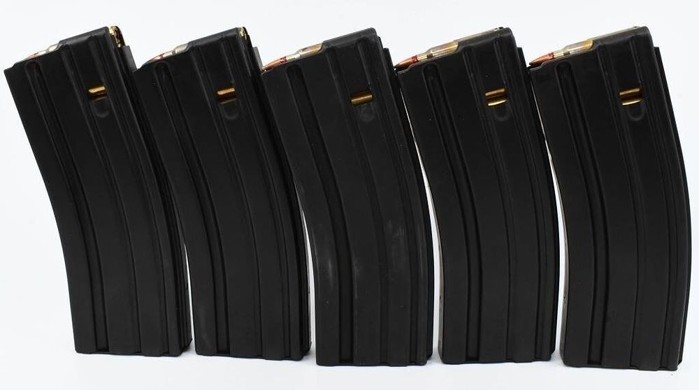 Lot 676: 5 Duramag Magazines Loaded With 5.56 Ammunition