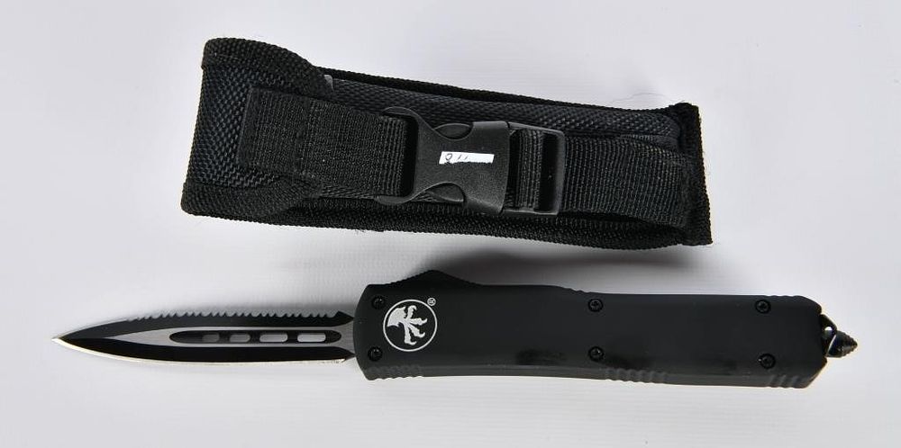 Lot 1172: CLONE Microtech UTX-85 Apocalyptic Serrated Knife