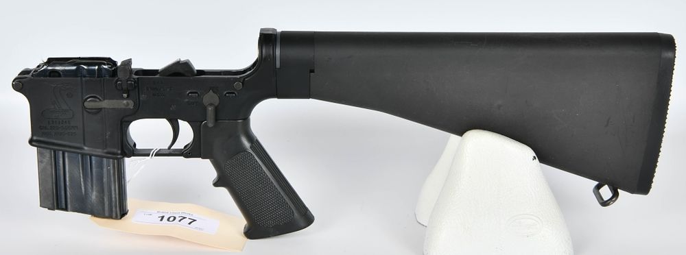 Lot 1077: Bushmaster XM15-E2S Complete Lower Receiver
