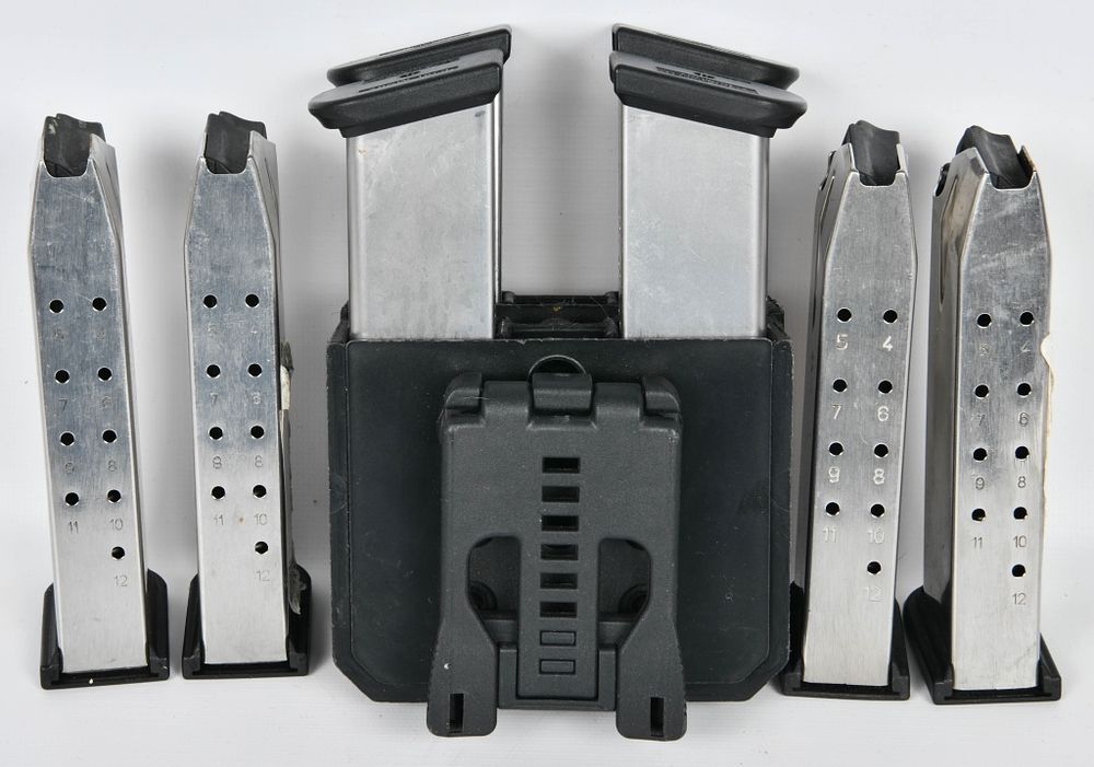 Lot 1235: (8) Springfield Armory 40 SW Factory Magazines
